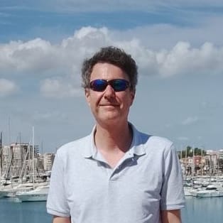 Stephen Murdoch beside the marina